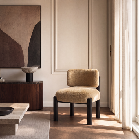 Fauteuil TOM fausse fourrure pieds noirs